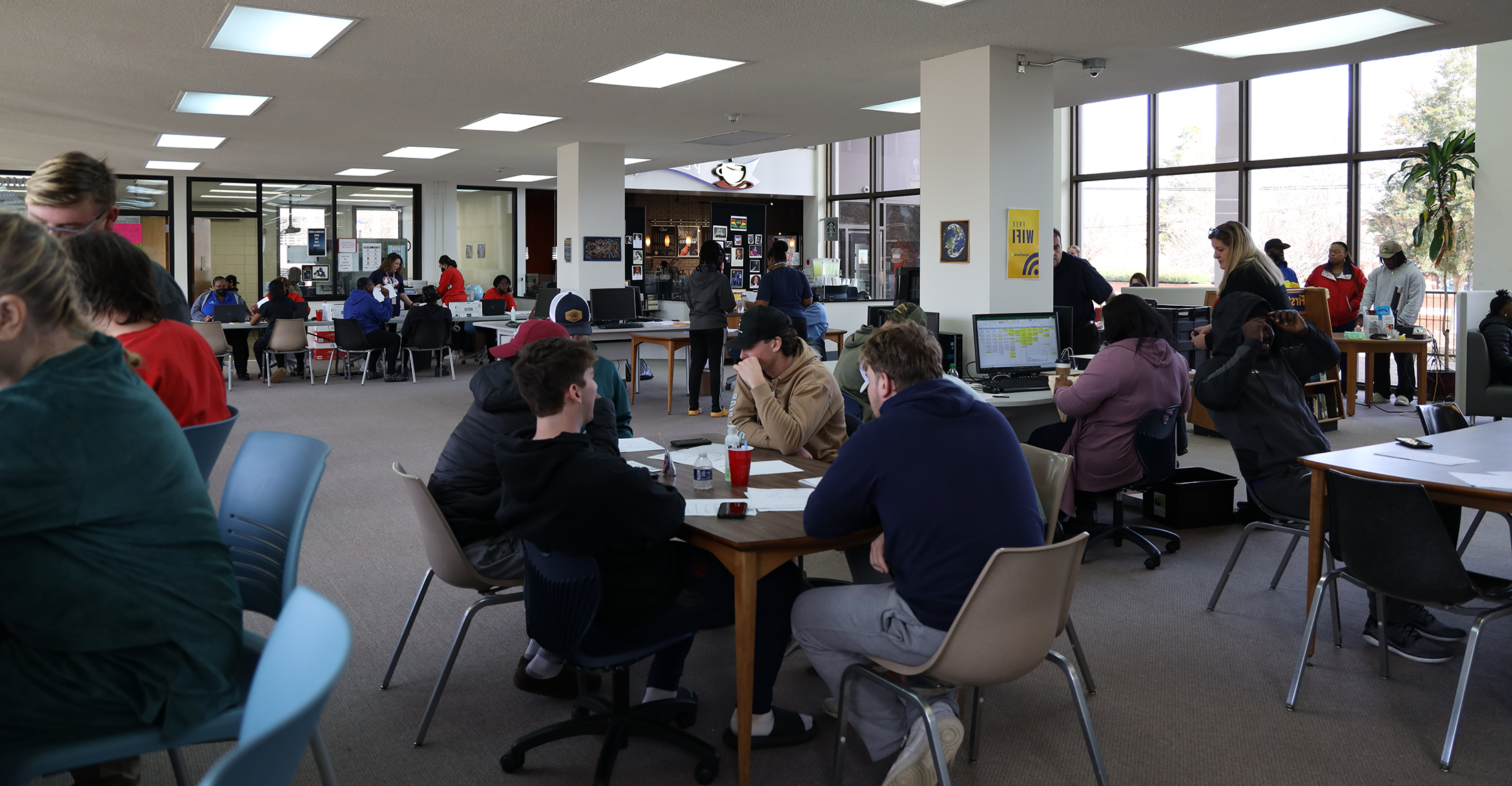 Students in college library during check-in